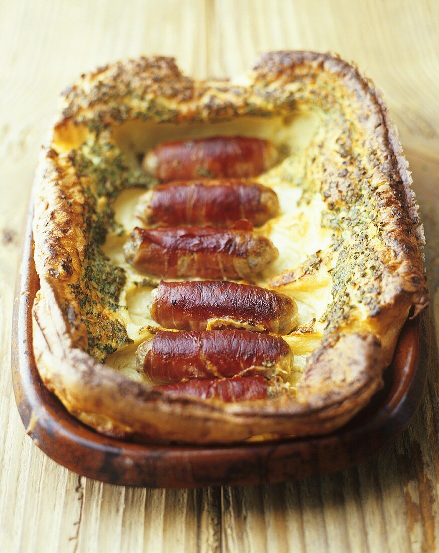 Toad in the hole (Bratwürstchen im Teig gebacken, England)