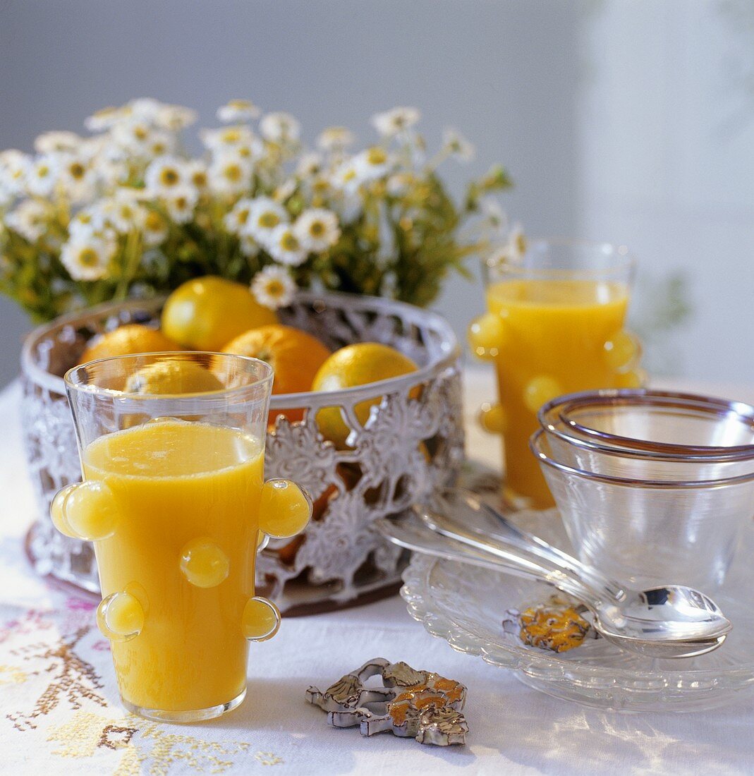 Still life with orange juice and citrus fruit