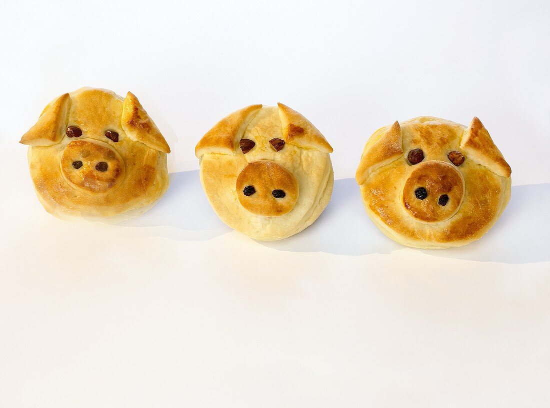 Three 'Lucky Pigs' in puff pastry