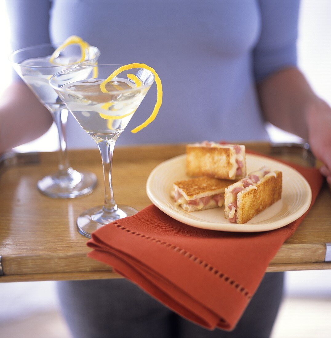 Ham and cheese on toast beside Martini glasses