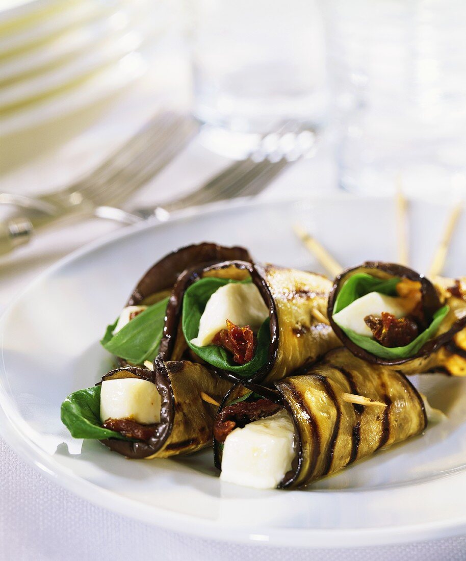 Barbecued aubergine rolls with cheese filling