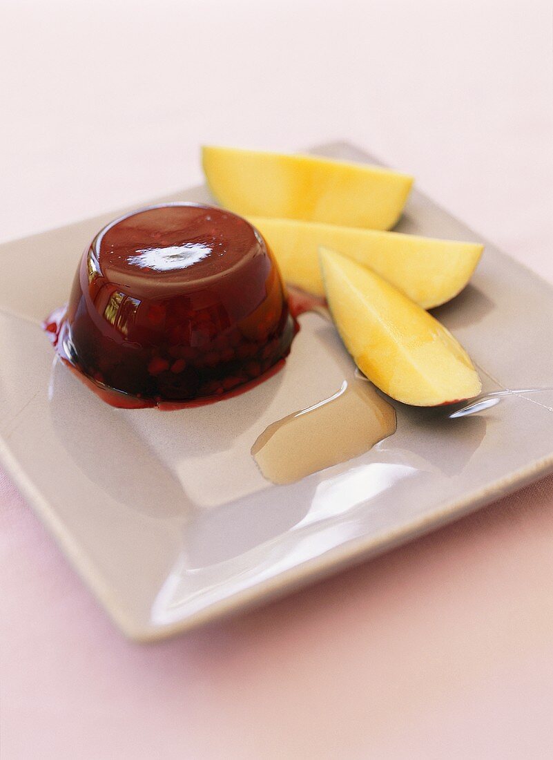Balsamic berry jelly and mango wedges