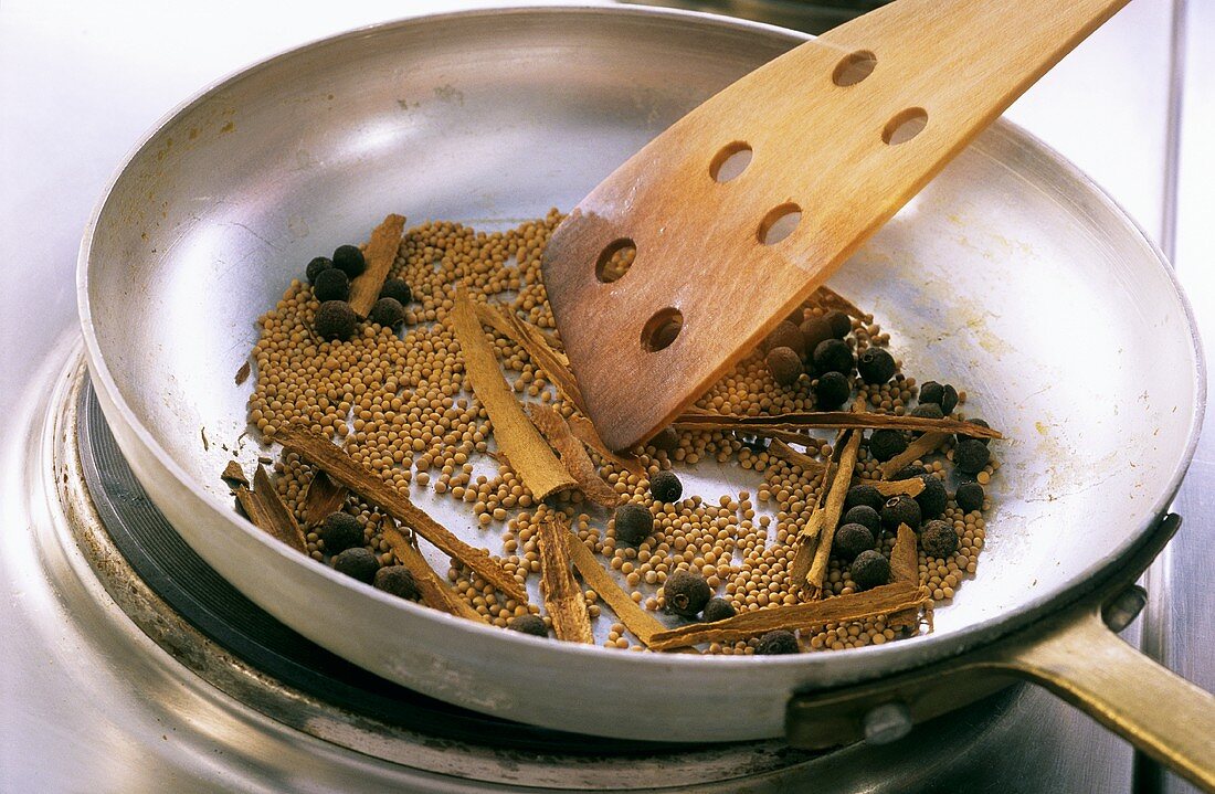 Roasting spices in frying pan
