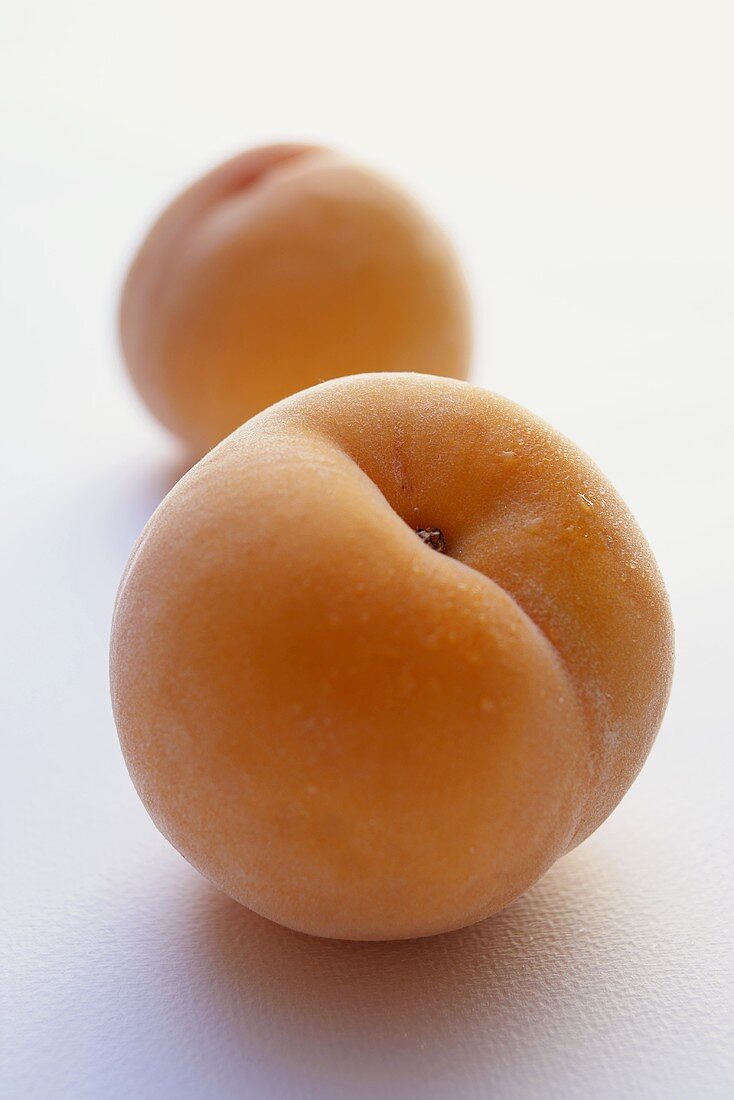 Whole Calanda peaches with drops of water