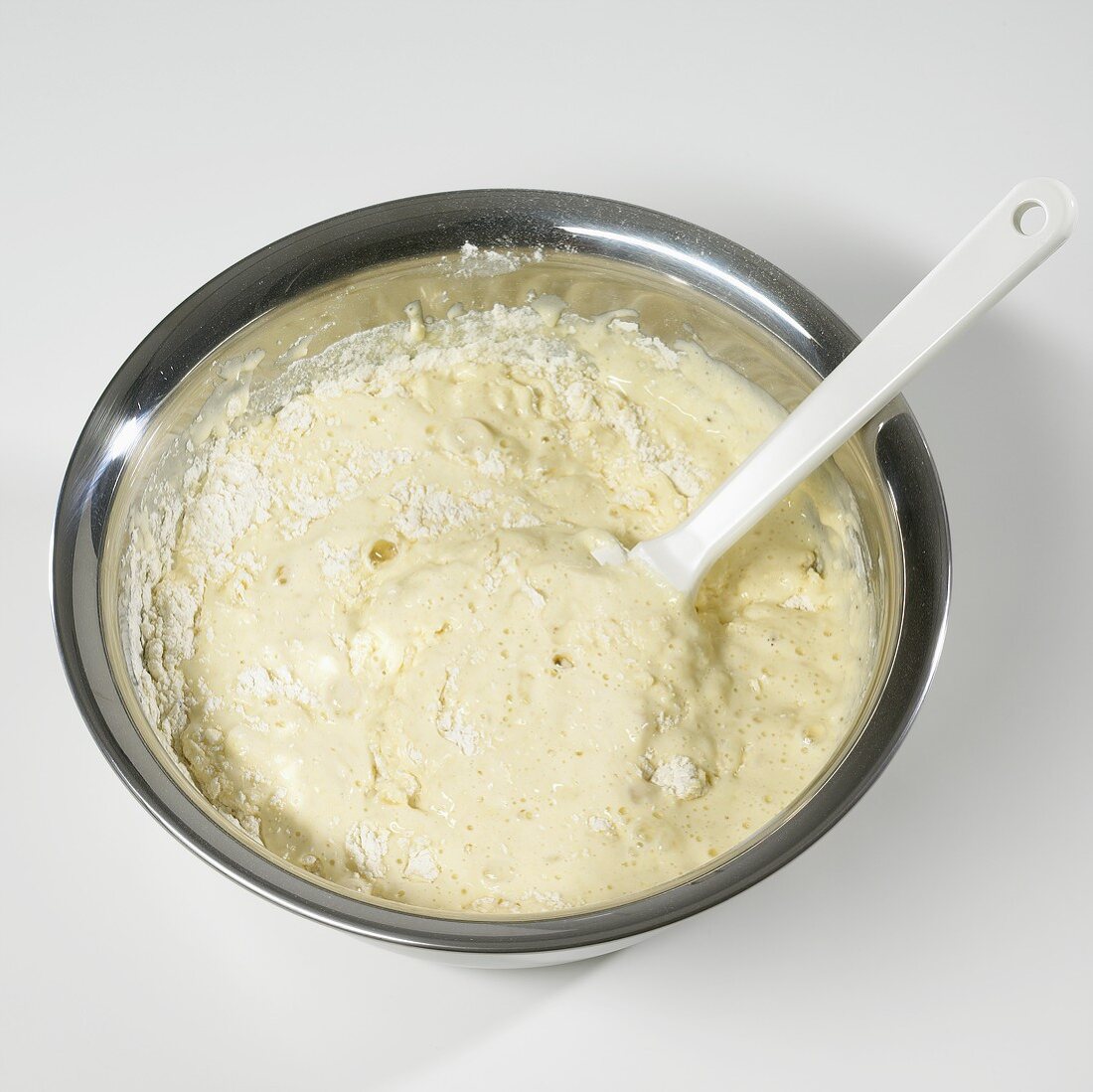 Making dough for spaetzle noodles