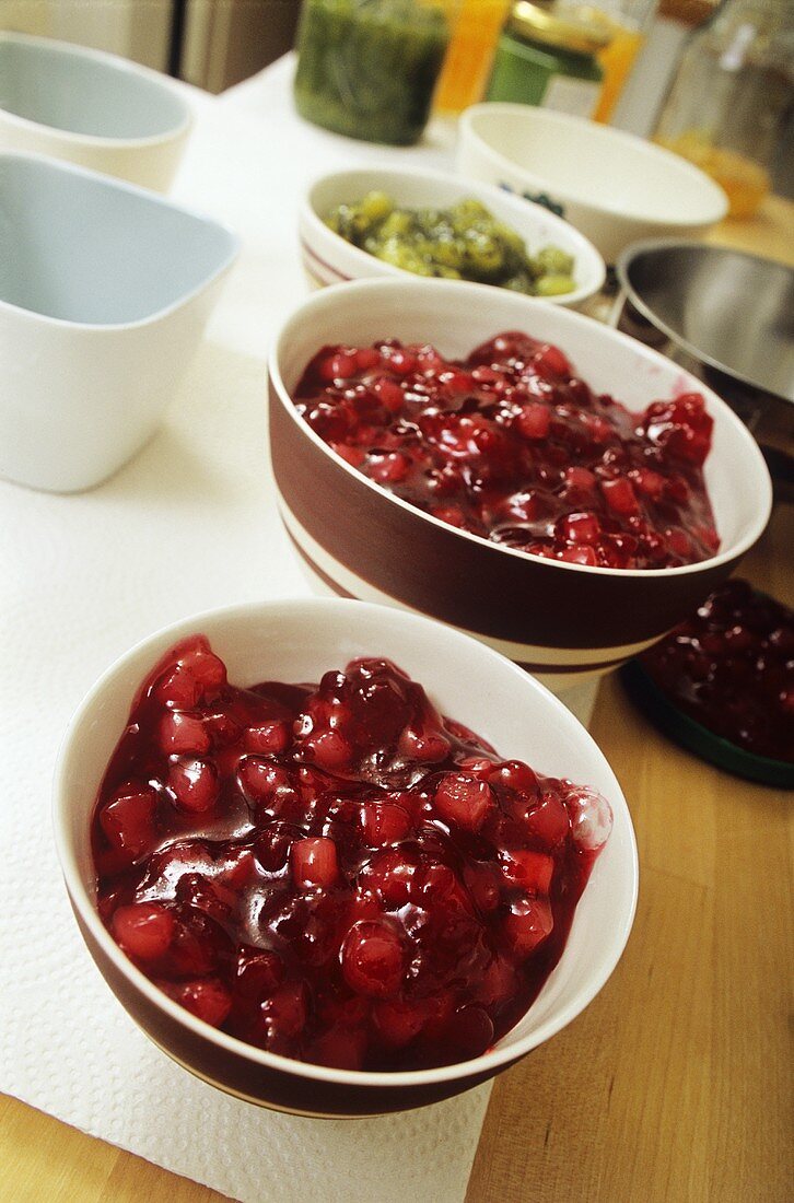 Pear and cranberry jam in a small bowl