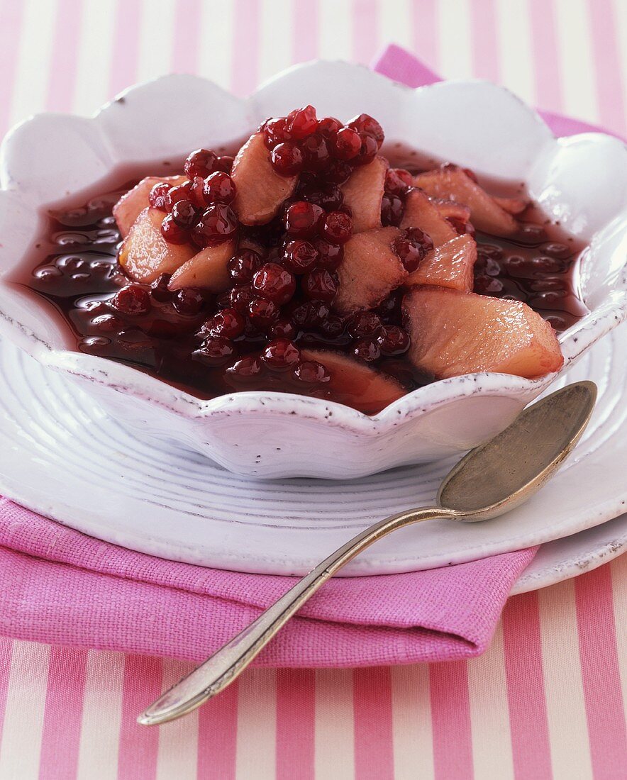Pear and cranberry jam in small bowl
