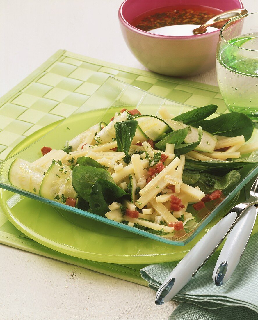 Cheese salad with bacon and courgettes