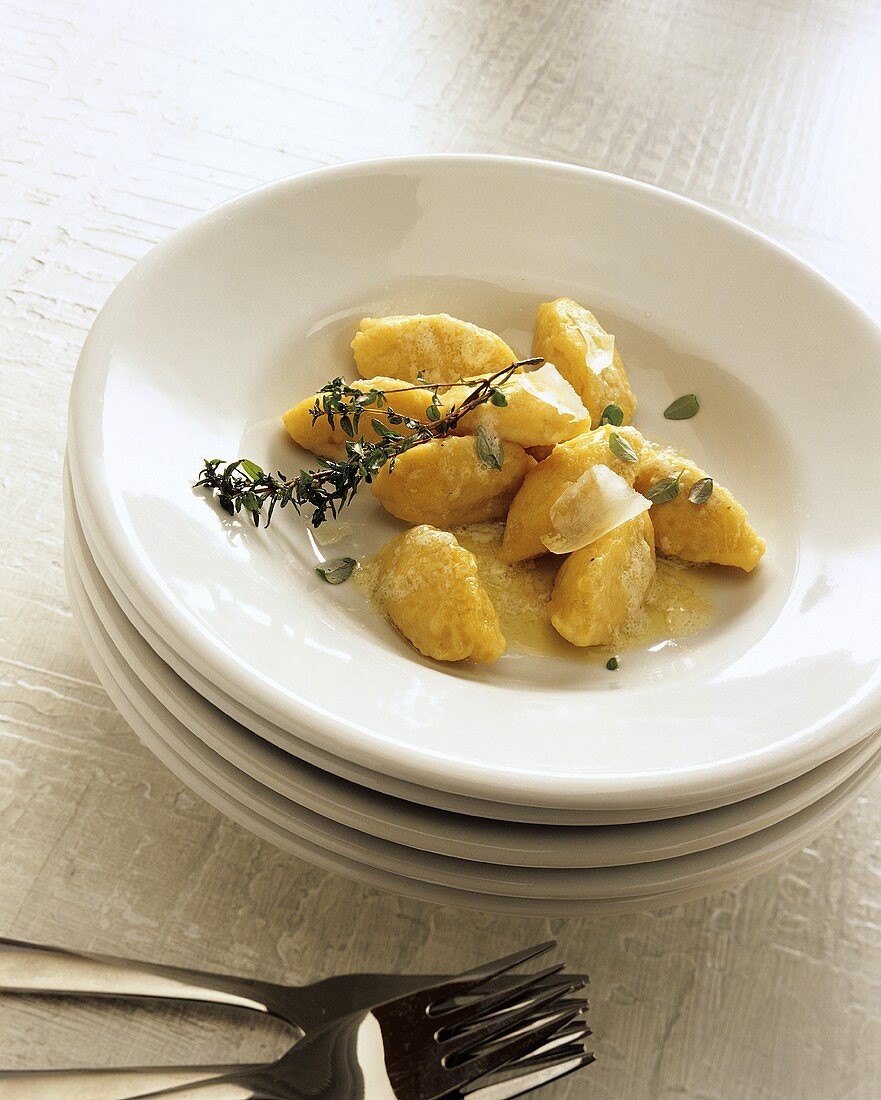 Semolina dumplings with butter and thyme