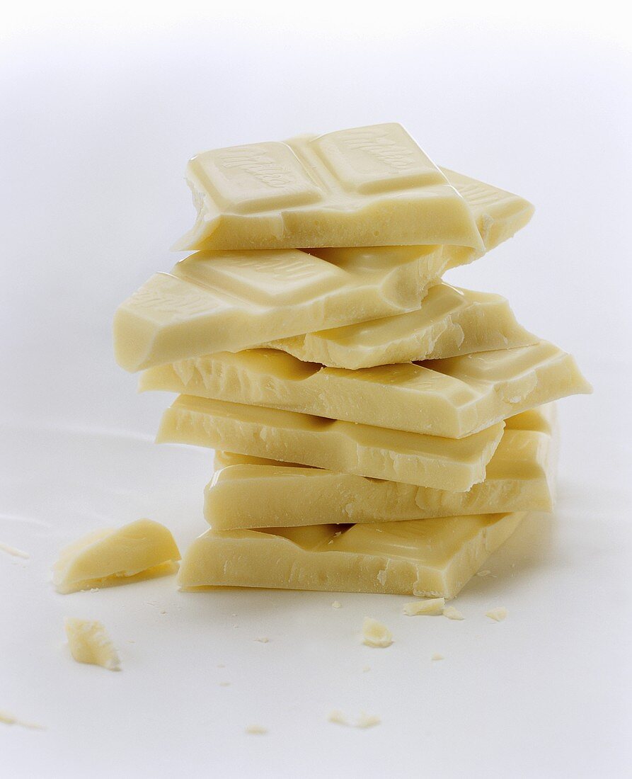 Pieces of white chocolate in a pile