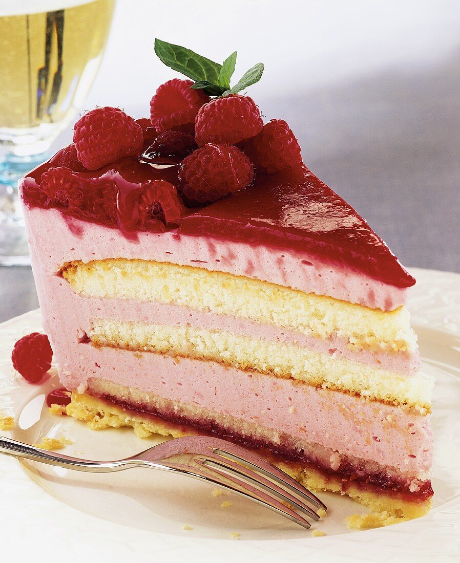 A piece of raspberry cream cake