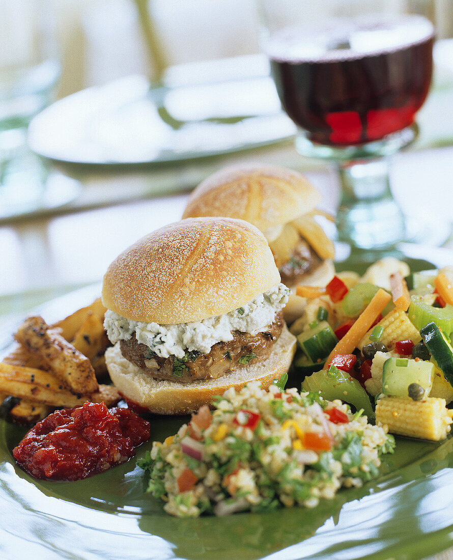 Lamb burger with herb feta, couscous salad & mixed pickles