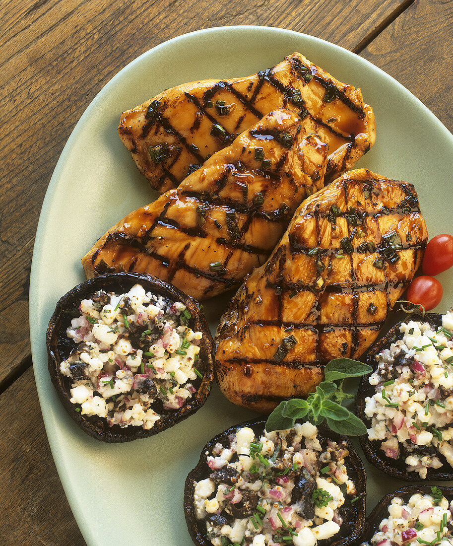 Grilled turkey steaks and stuffed mushrooms