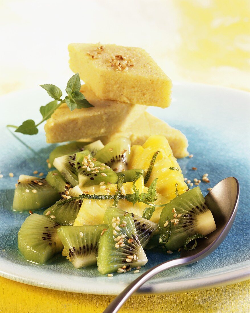 Sweet polenta with kiwi fruit salad