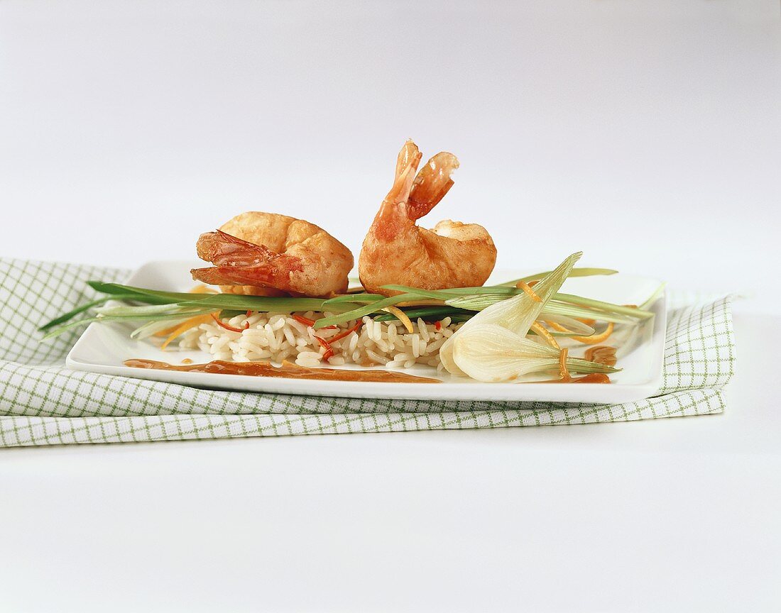 Shrimps with sesame and orange crust and rice