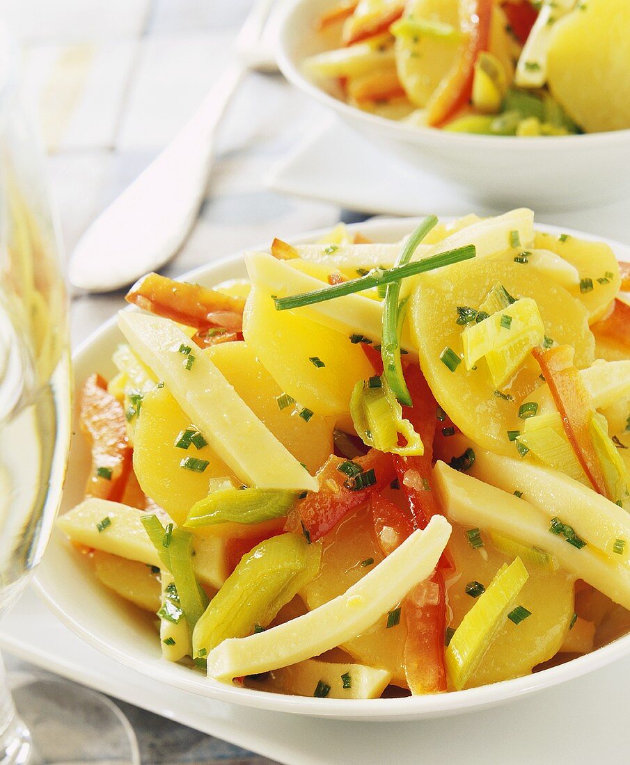 Potato salad with cheese and peppers