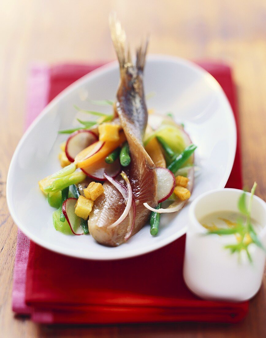 Matje herring fillet with radish and bean salad