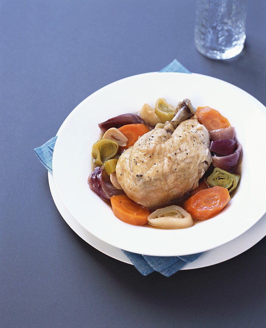 Braised chicken on bed of vegetables