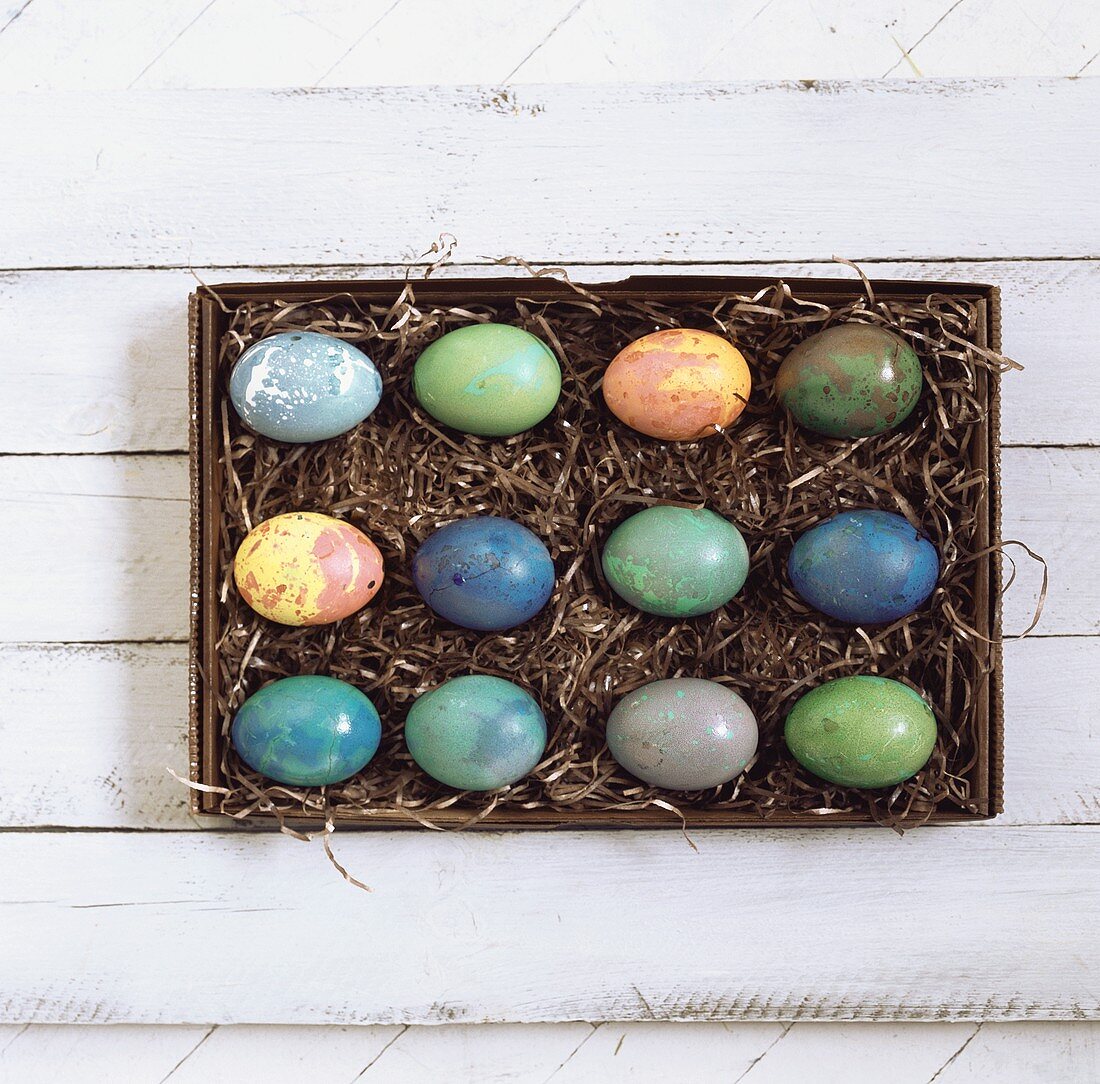 Box of coloured Easter eggs
