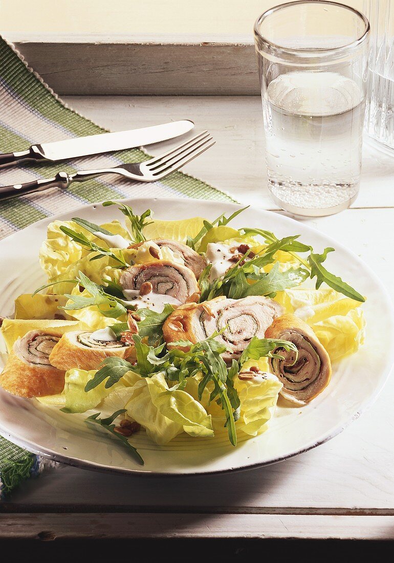 Summer salad with turkey rolls