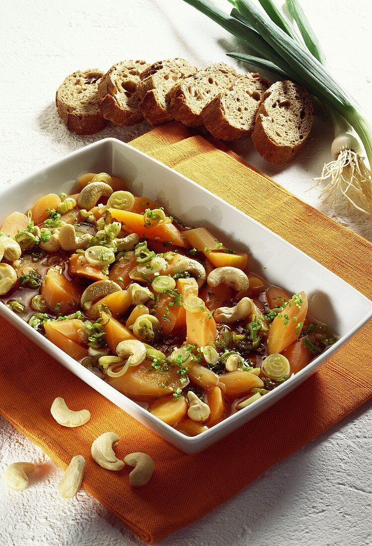 Marinated carrots with herbs and cashew nuts