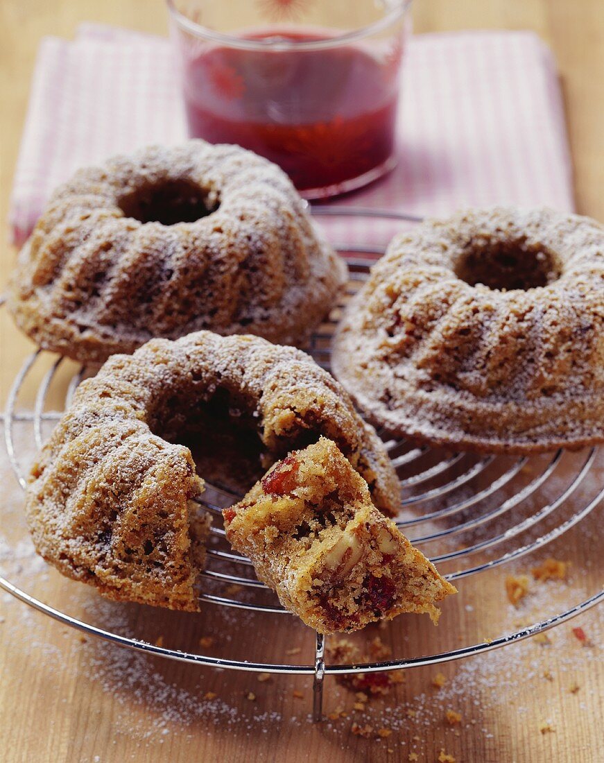 Three small spiced cranberry and nut cakes