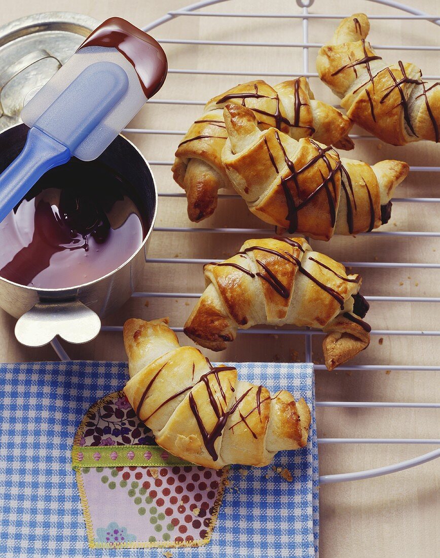 Puff pastry croissants with chocolate and banana filling