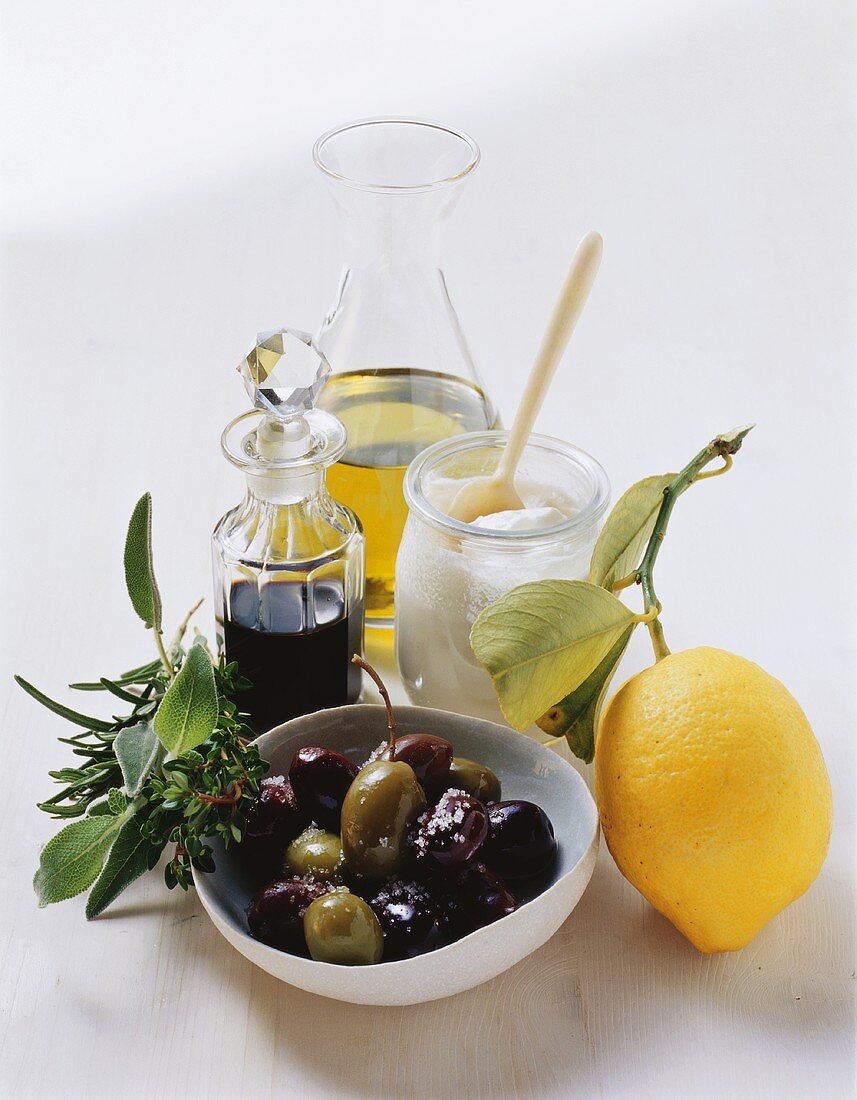 Mediterranean ingredients: olives, balsamic vinegar, oil, yoghurt, lemon