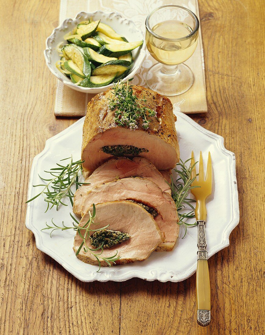 Italian-style stuffed roast pork with courgettes