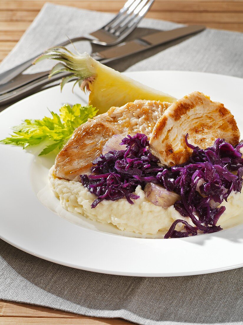 Gingered turkey steaks with pineapple red cabbage & mash