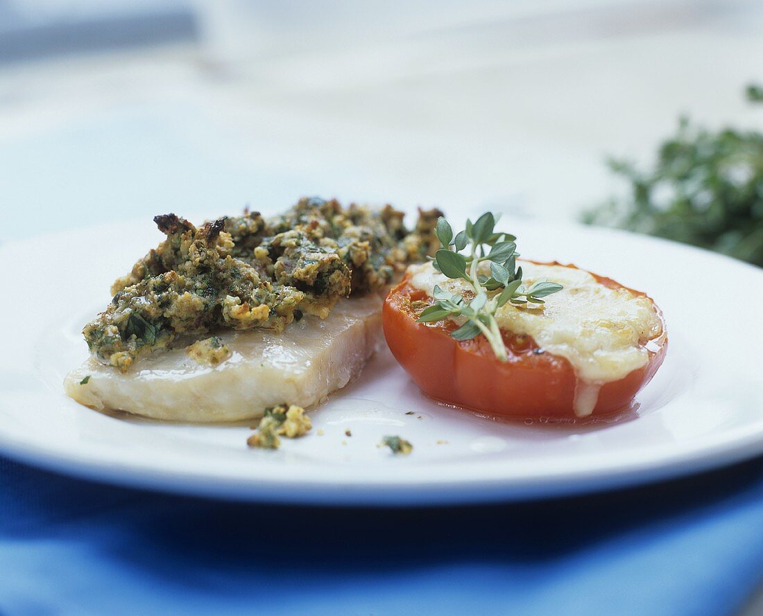 Fillet of Nile perch with herb crust and grilled tomato