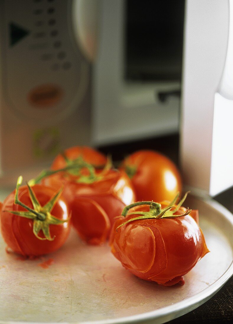 Baked, heated tomatoes (can be skinned easily)