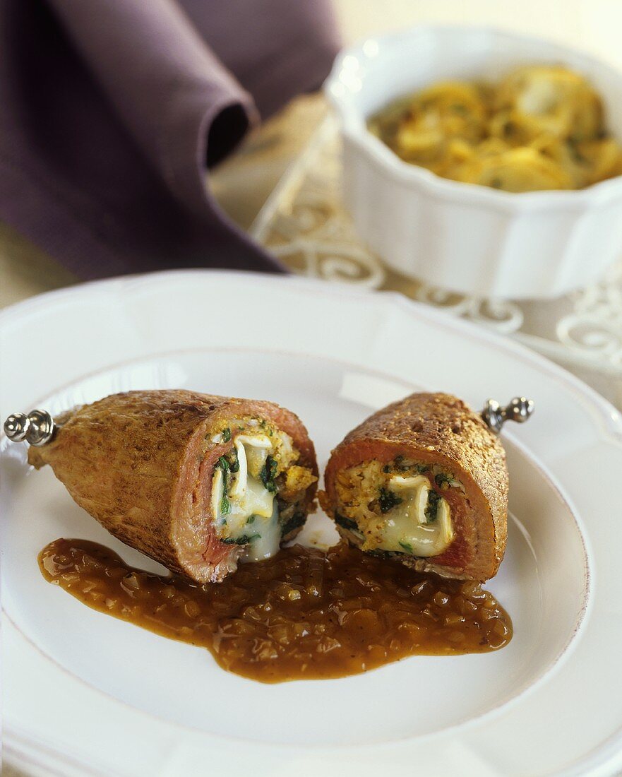 Veal roulade with goat's cheese & spinach filling & wine sauce
