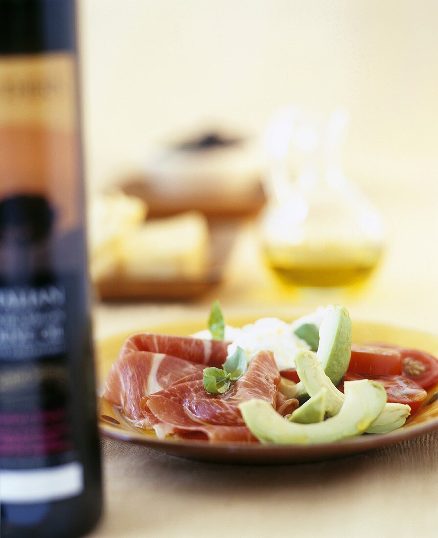 Parma ham with avocado and tomatoes