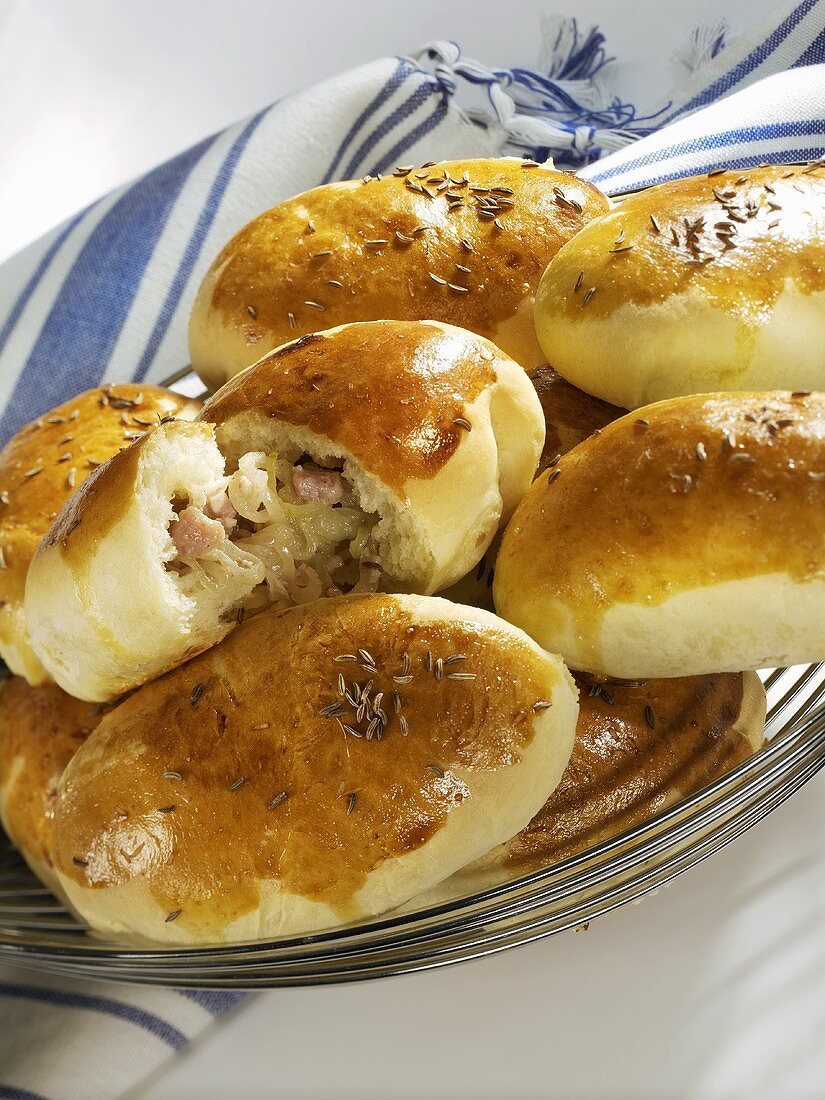 Small yeast buns with onion and bacon filling