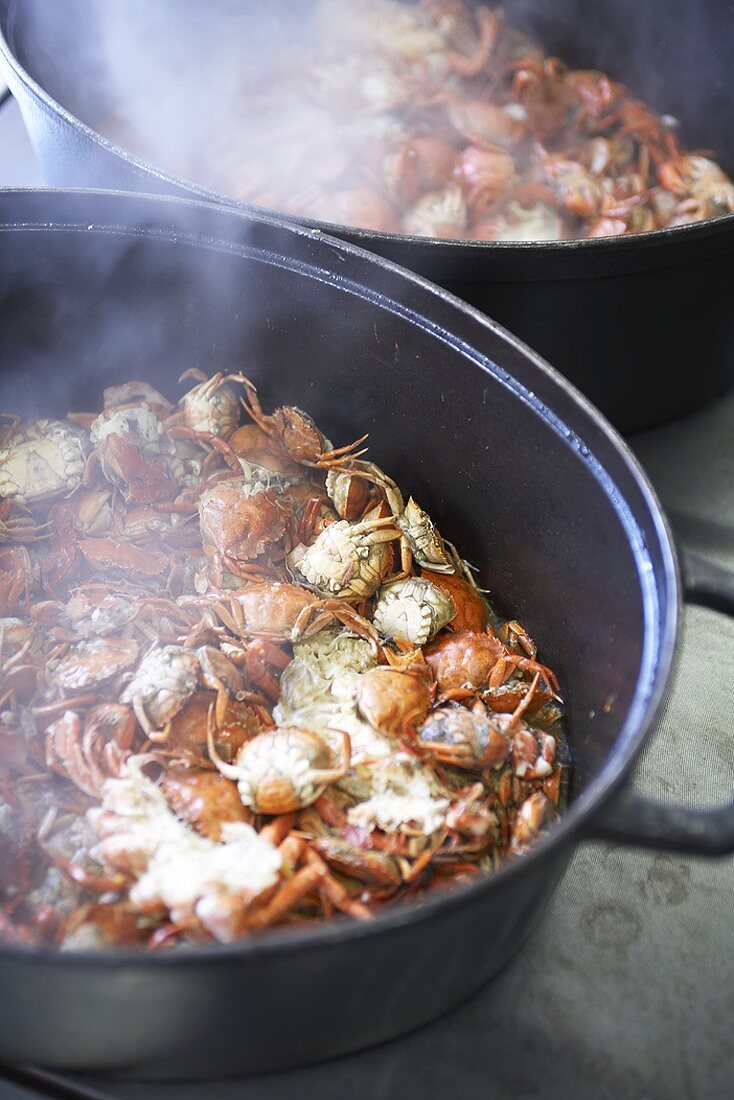Crabs in cooking pots