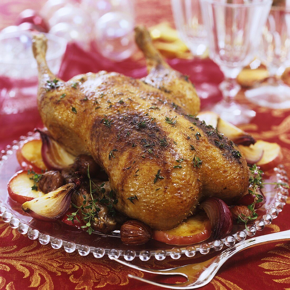Festive roast duck with apples and sweet chestnuts
