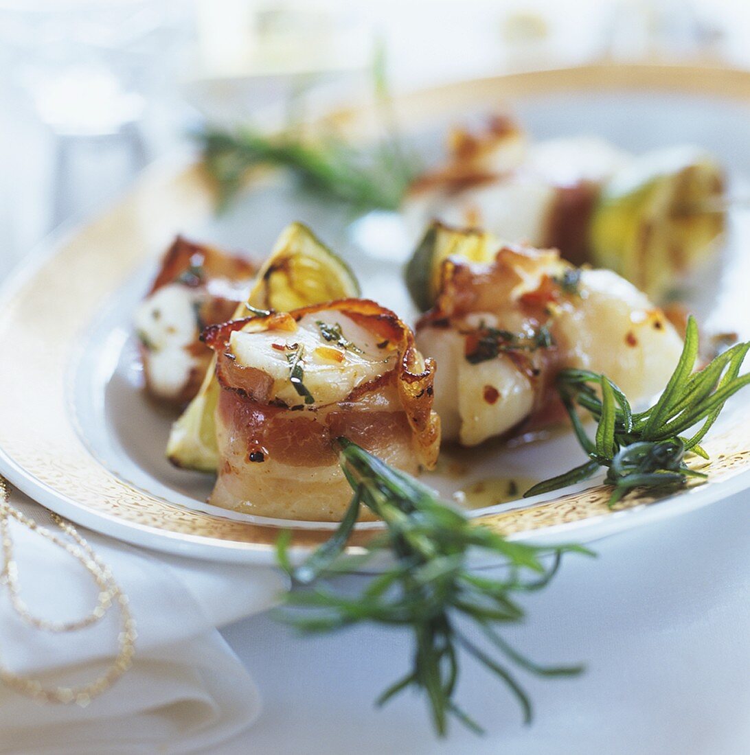 Monkfish and bacon on rosemary skewers