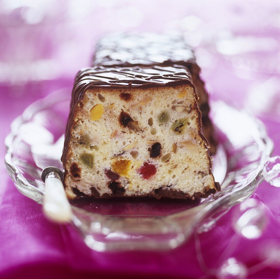 Fruit cake with chocolate icing