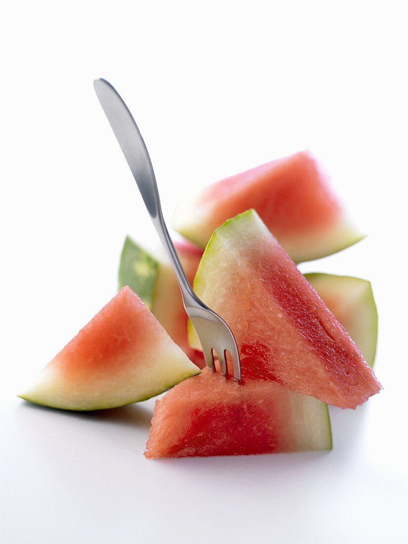 Watermelon in pieces with fork