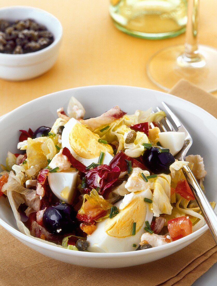 Mixed salad with olives, feta and egg