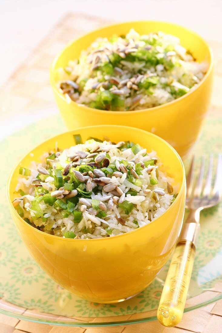 Rice salad with spring onion and sunflower seeds