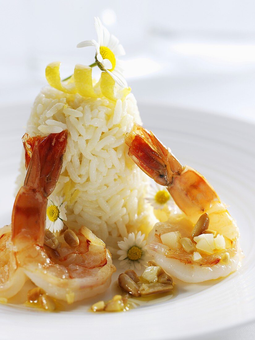 Fried shrimps on rice with daisies