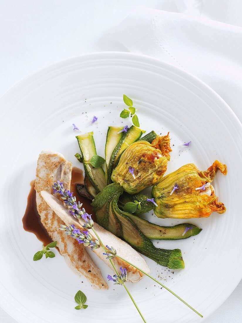 Fried rabbit fillet with stuffed courgette flowers