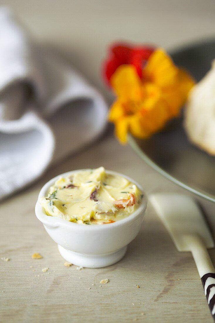 Nasturtium butter in a small bowl