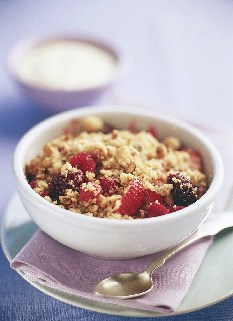 Mixed berries with chopped nuts and honey