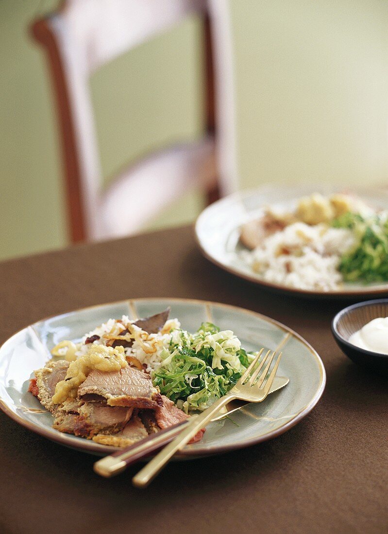 Lamb with cabbage salad and rice