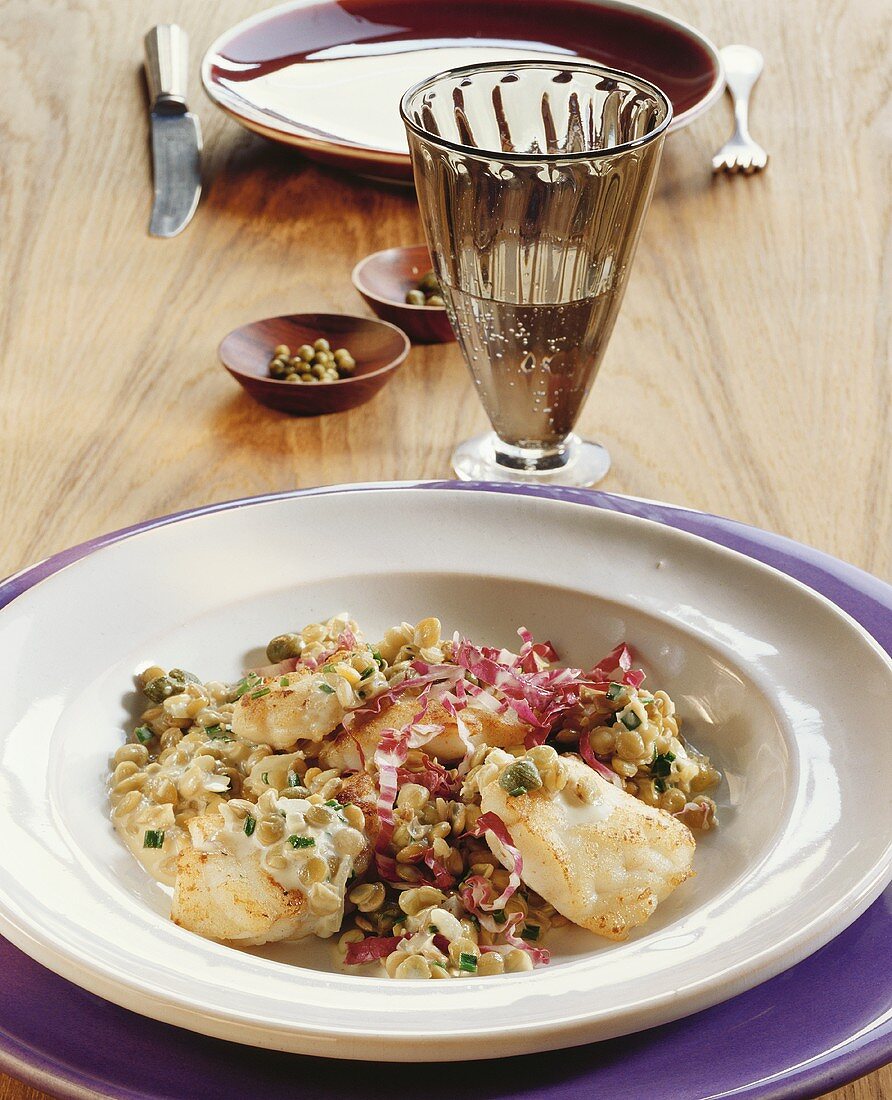 Lentil salad with fried fish fillet