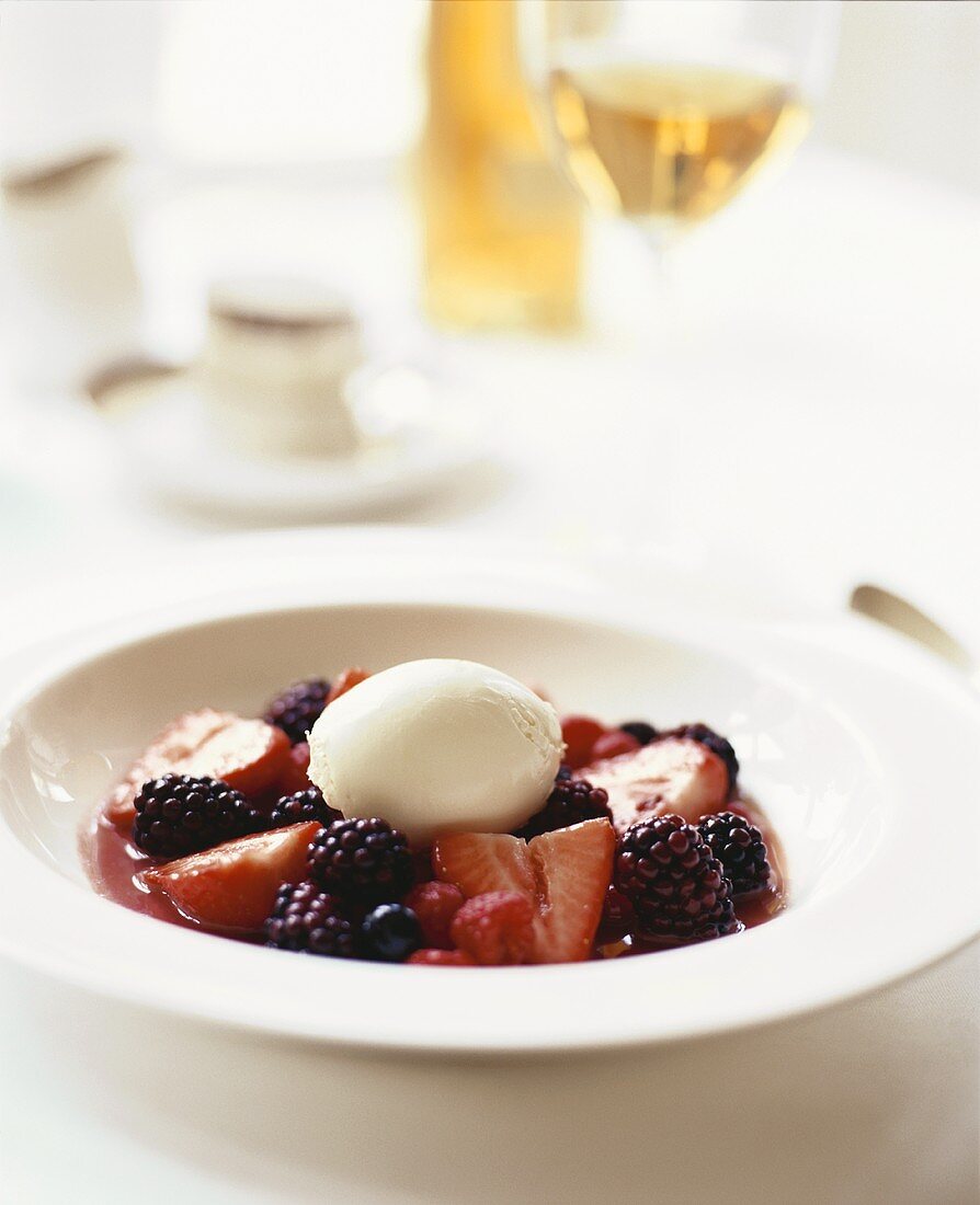 Mixed berries with vanilla ice cream