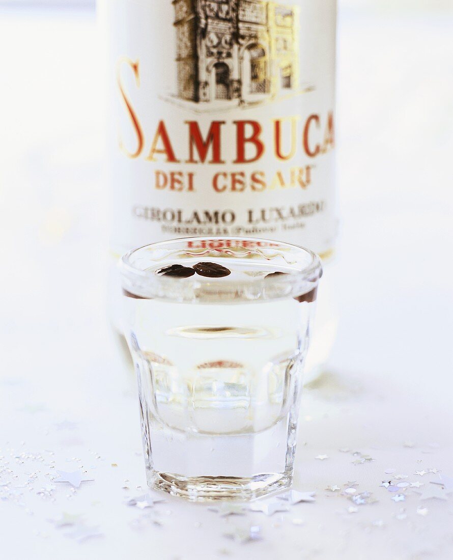 Sambuca with bottle in background